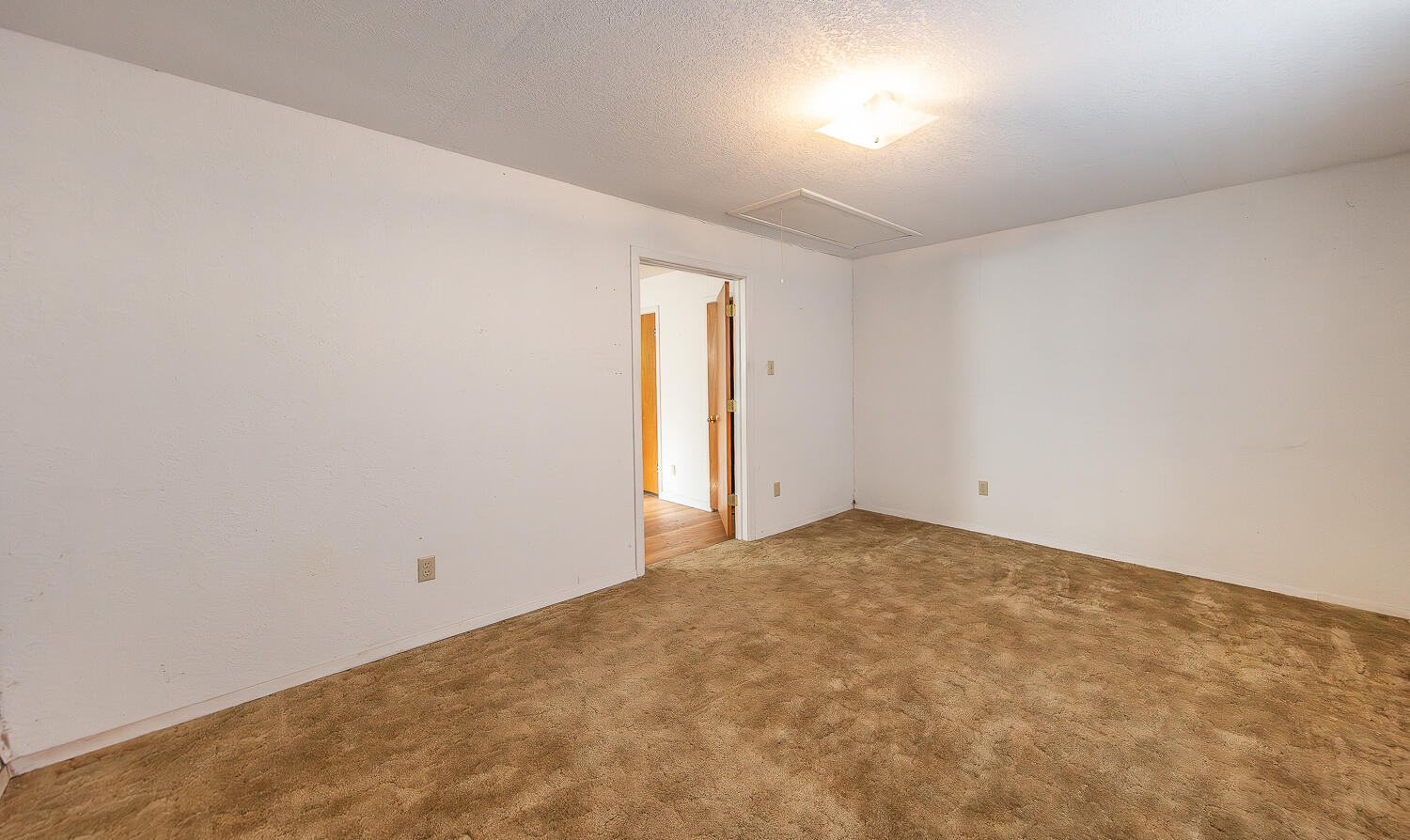 1918 42nd Street Lubbock, TX 79412 - Photo 19 of 29 an empty room with a window