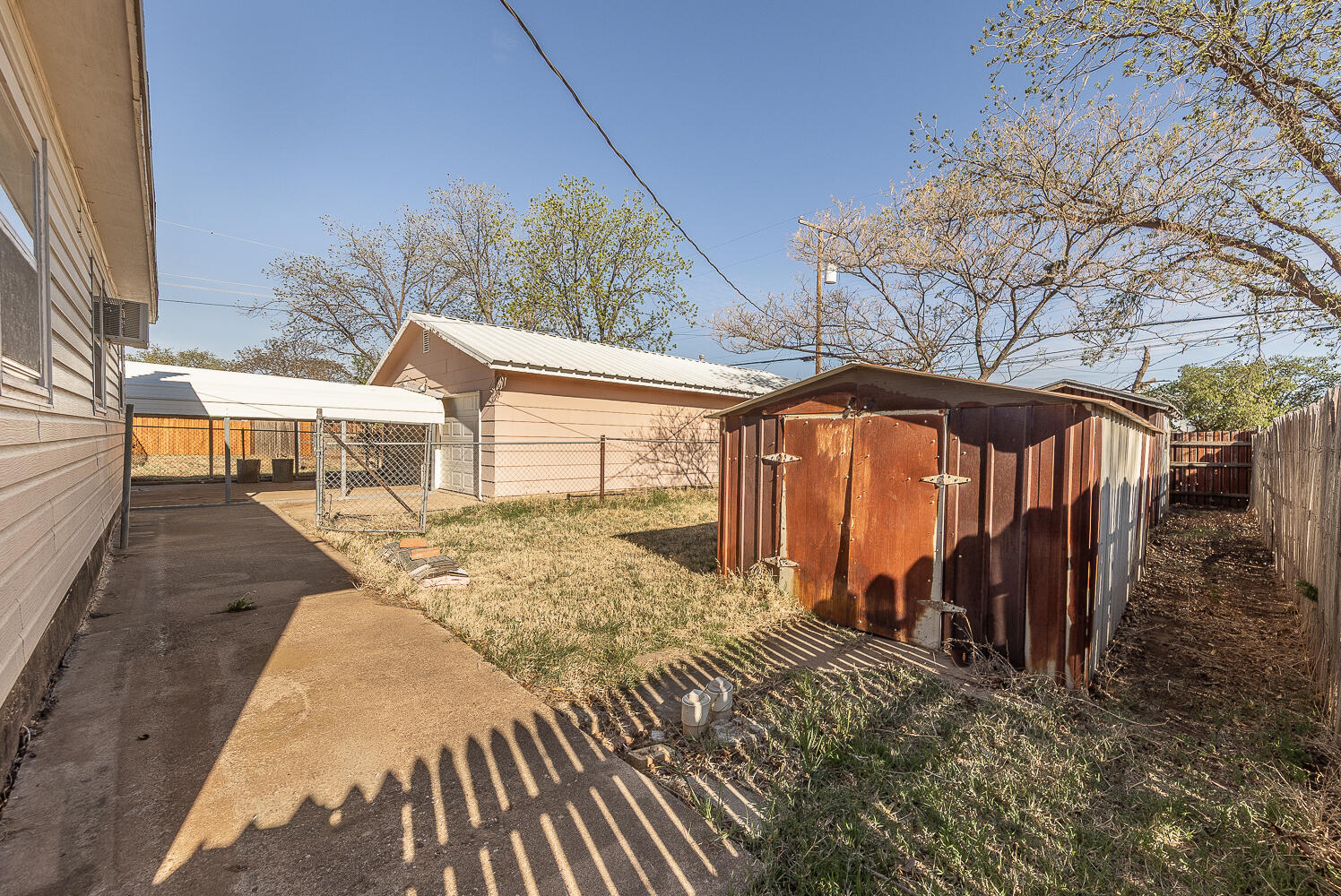 1918 42nd Street Lubbock, TX 79412 - Photo 21 of 29 a front view of a house with a yard