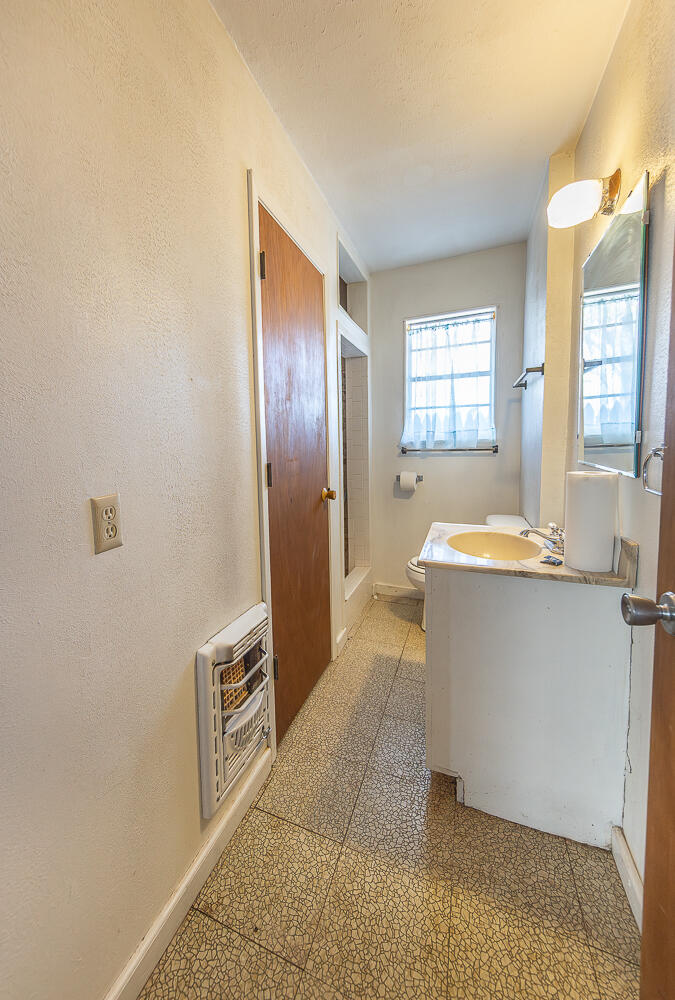 1918 42nd Street Lubbock, TX 79412 - Photo 25 of 29 a view of a kitchen with granite countertop cabinets