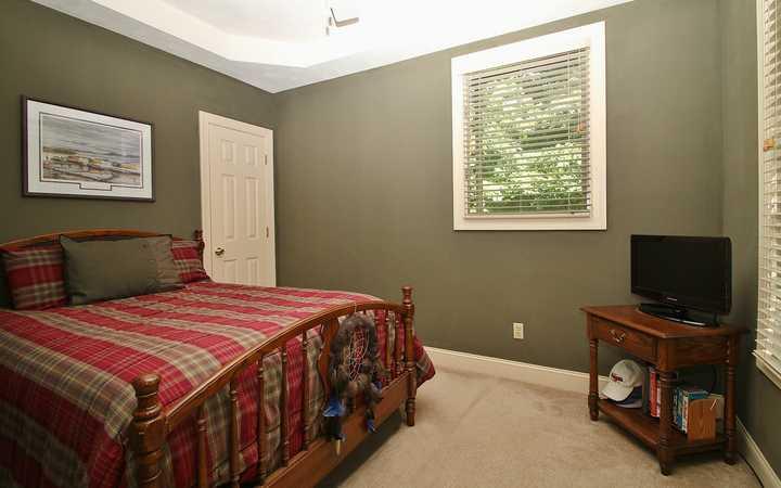 848 3 Quarter Point Road Wirtz, VA 24184 - Photo 22 of 39 a bedroom with a bed and a window