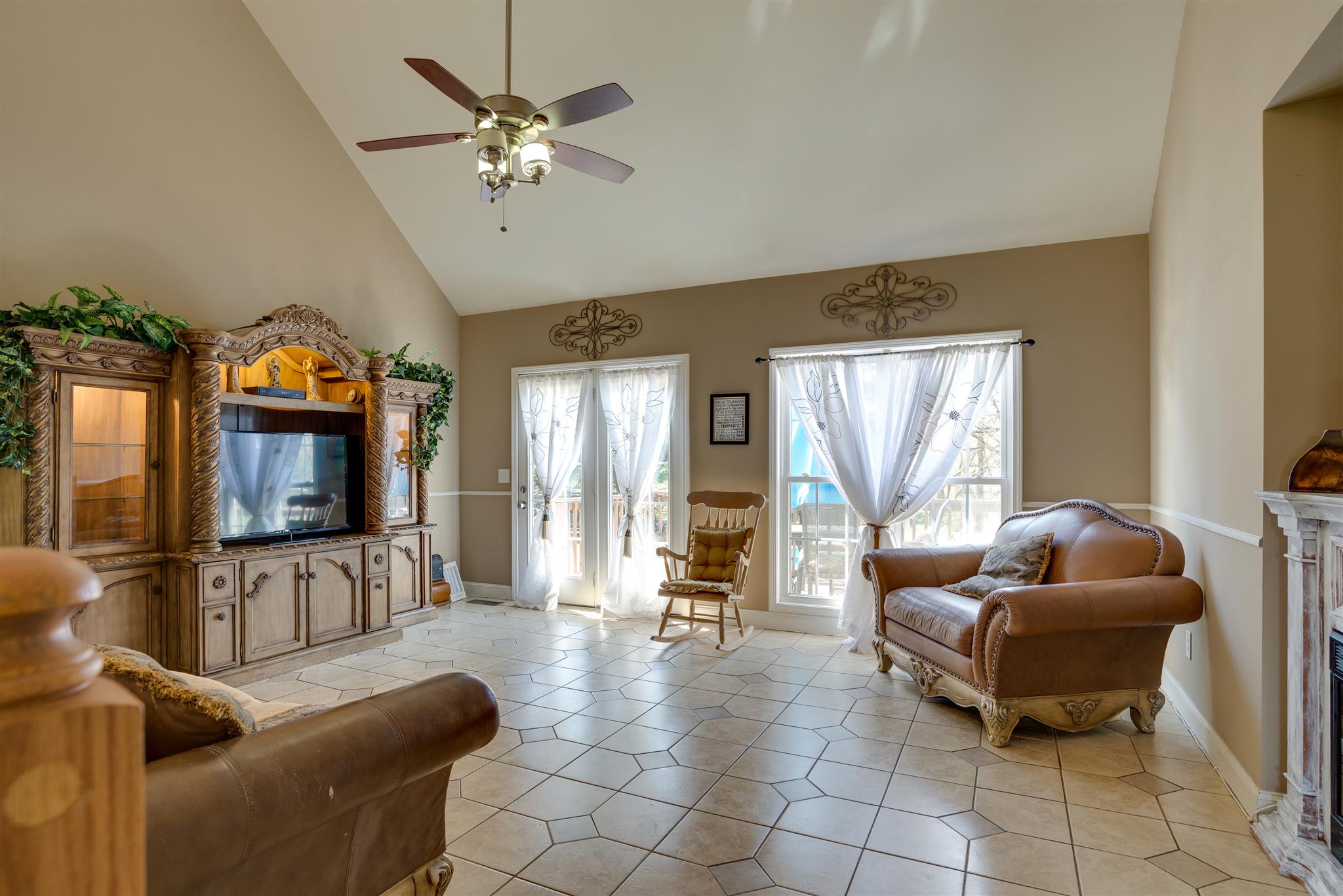 2225 Clara Mathis Road Spring Hill, TN 37174 - Photo 8 of 19 a living room with furniture and a flat screen tv