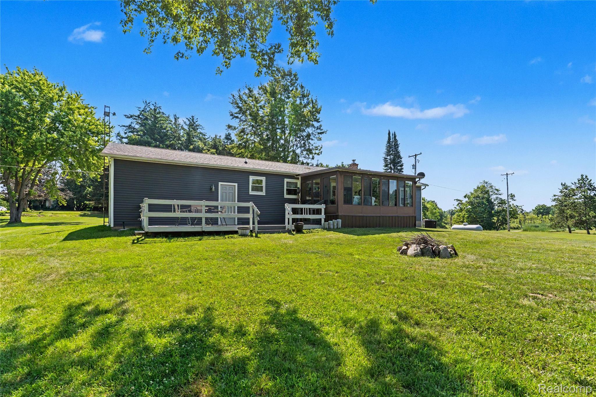 4427 North Washburn Road Davison, MI 48423 - Photo 34 of 37 Deck and 3-Season Room.