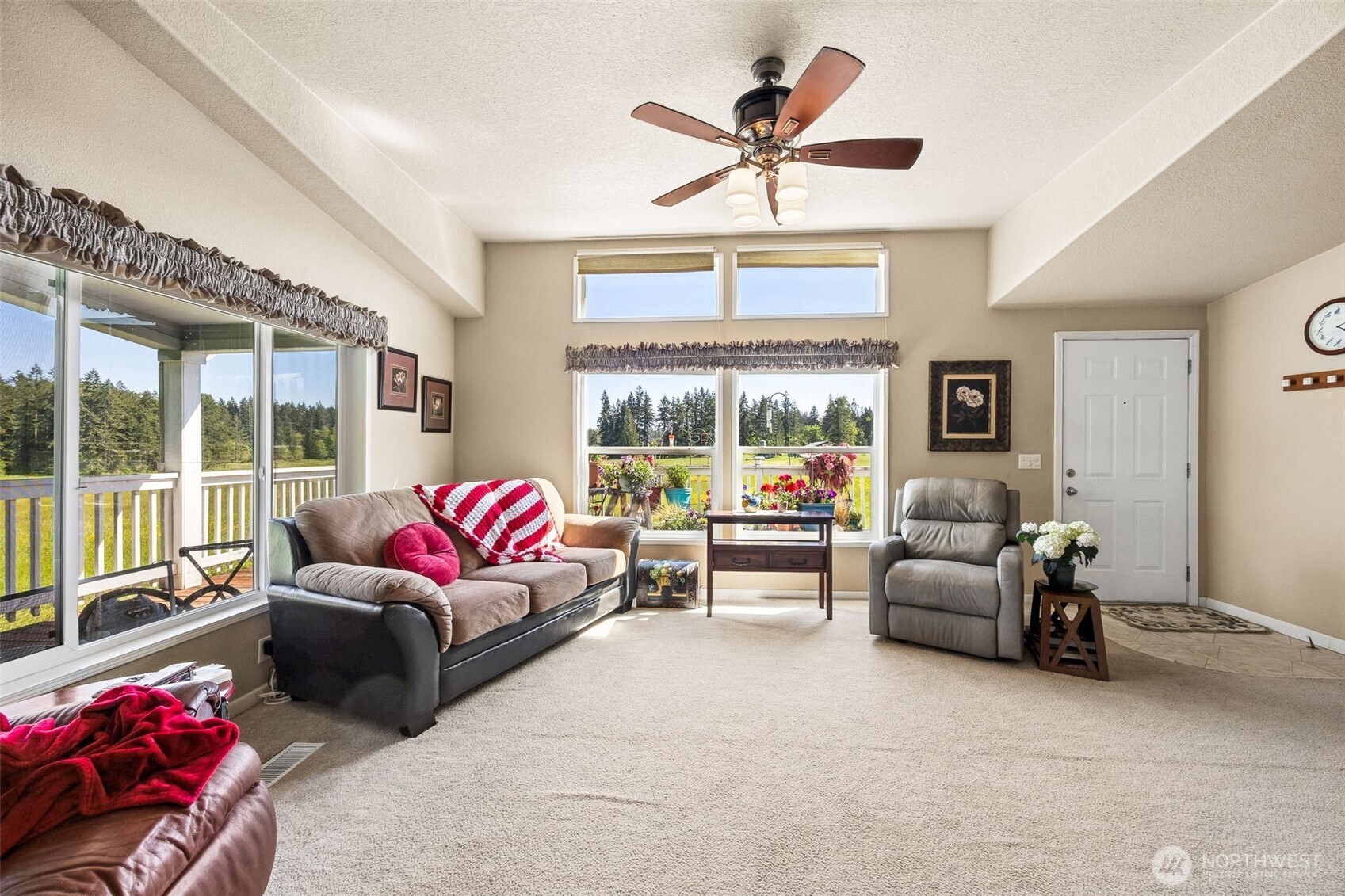 1716 304th Street East Roy, WA 98580 - Photo 15 of 21 a living room with furniture and a large window