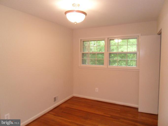 3525 Cornell Road Fairfax, VA 22030 - Photo 2 of 27 2nd Upstairs Bedroom with Wood Floors