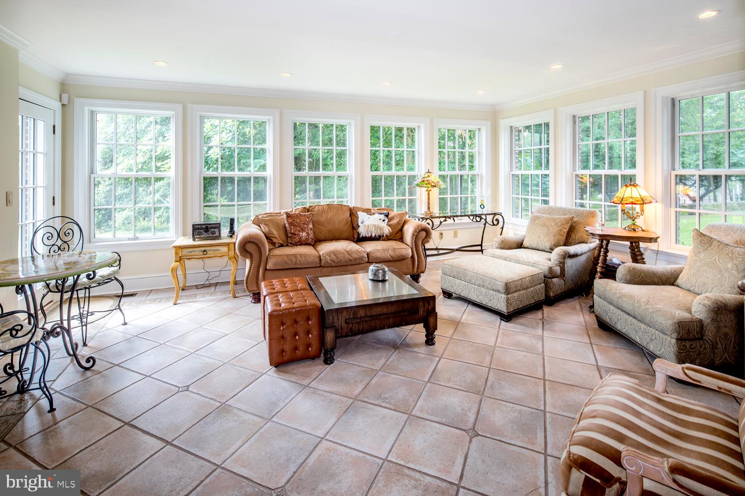 415 Conshohocken State Road Penn Valley, PA 19072 - Photo 12 of 31 Large family room with exit to side patio.