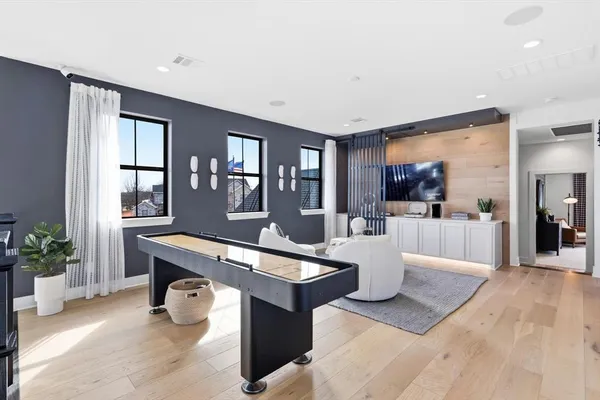 a living room with furniture and a table