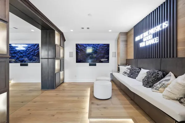 a living room with a couch and a flat screen tv