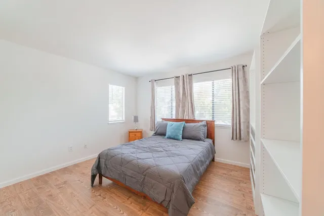 a room with a sink and a mirror