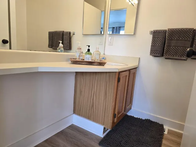 a view of a hallway with a window