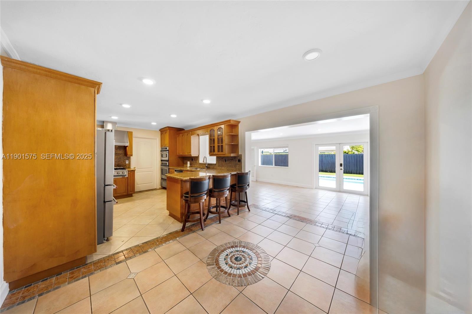 10501 Southwest 126th Avenue Miami, FL 33186 - Photo 11 of 42 a view of a dining room with furniture