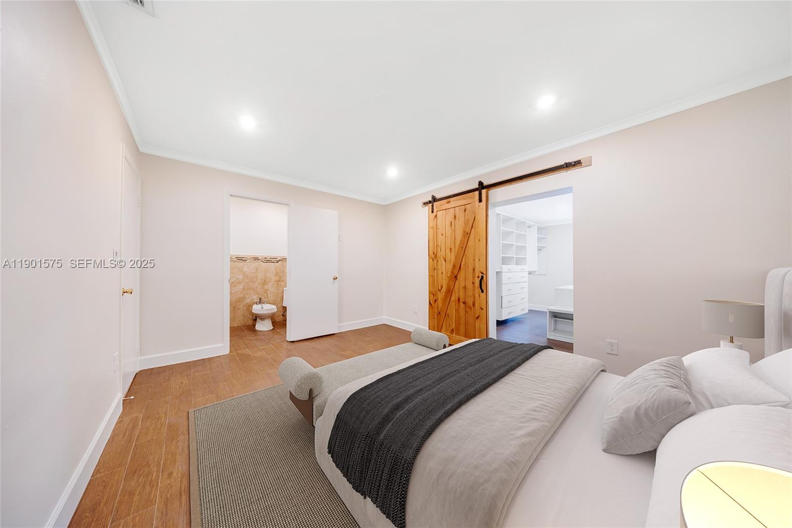 10501 Southwest 126th Avenue Miami, FL 33186 - Photo 20 of 42 a bedroom with a bed and a couch