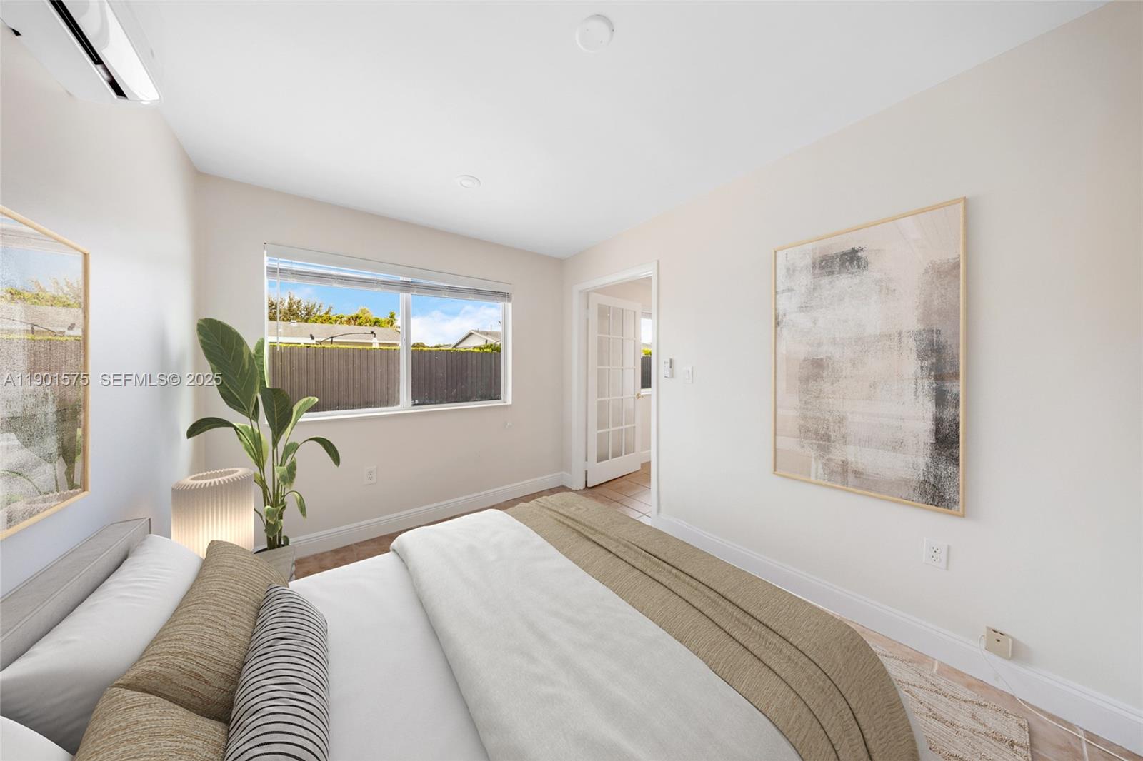 10501 Southwest 126th Avenue Miami, FL 33186 - Photo 25 of 42 a bedroom with a bed and a window