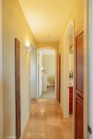 a bedroom with a bed and ceiling fan