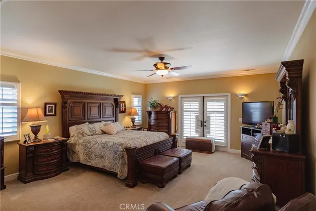 a bathroom with a sink and mirror with bathtub