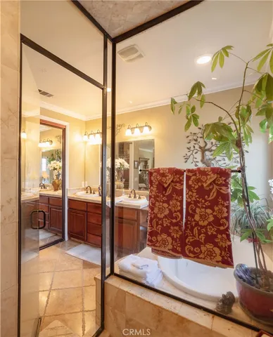 a living room with furniture a couch and a window