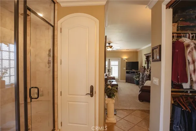 a view of a dining room with furniture and a window