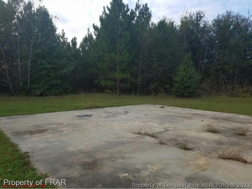 4741 Wade-Stedman Road Wade, NC 28395 - Photo 6 of 8 a view of a yard
