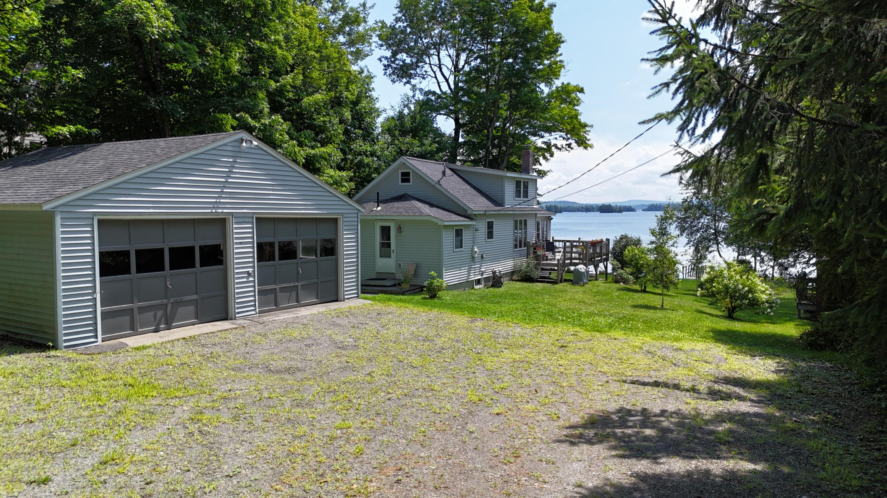 321 Harfords Point Road Greenville Junction, ME 04442 - Photo 2 of 36 DJI_20240801123158_0038_D