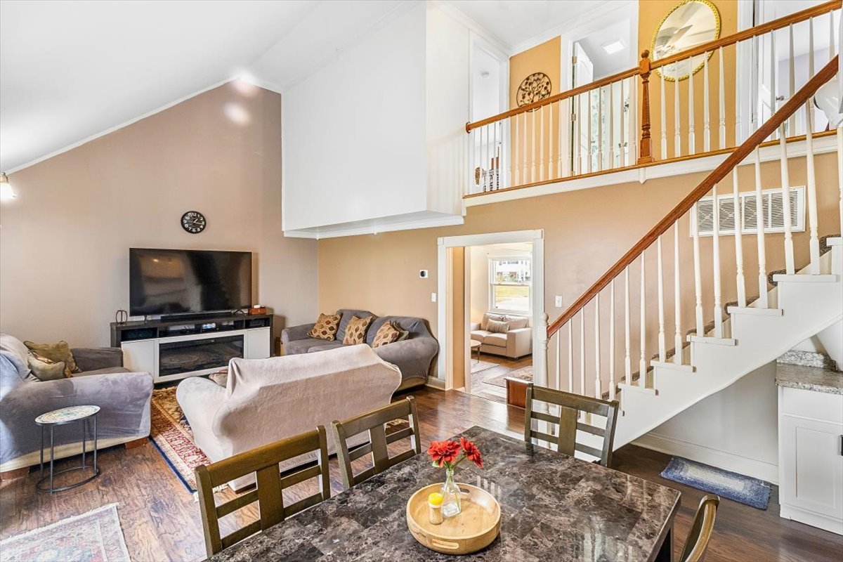 6881 Hickory Street Hanover Park, IL 60133 - Photo 13 of 23 a living room with furniture and a flat screen tv