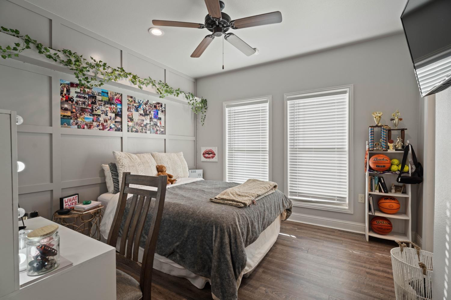 813 Avenue T Shallowater, TX 79363 - Photo 21 of 36 a bedroom with a bed and a bookshelf