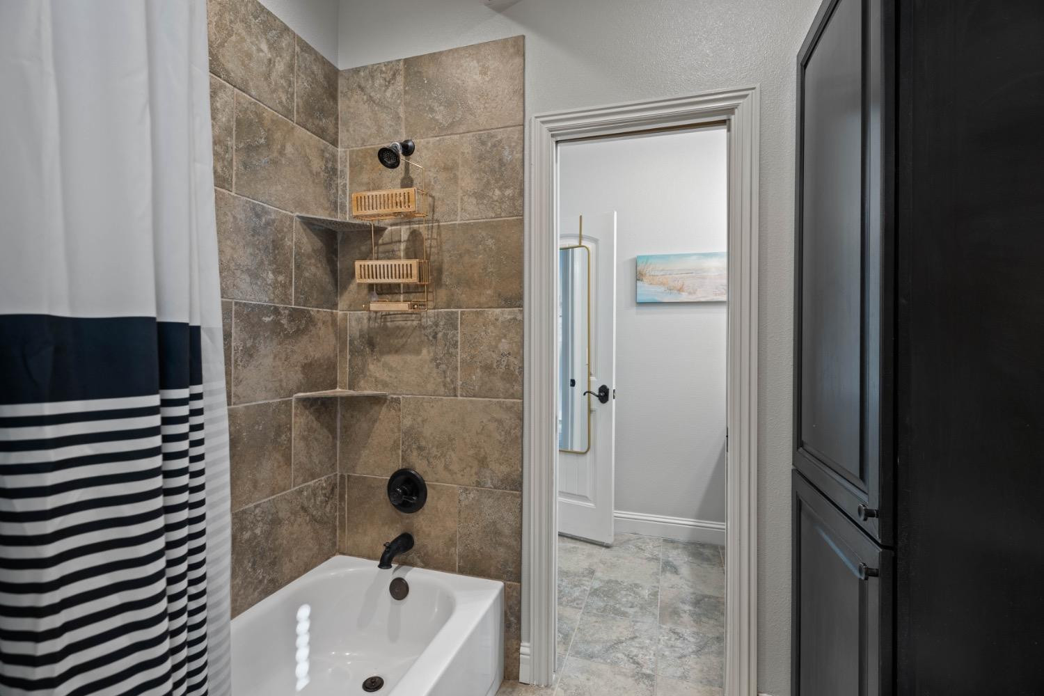 813 Avenue T Shallowater, TX 79363 - Photo 24 of 36 a bathroom with a sink a toilet and shower