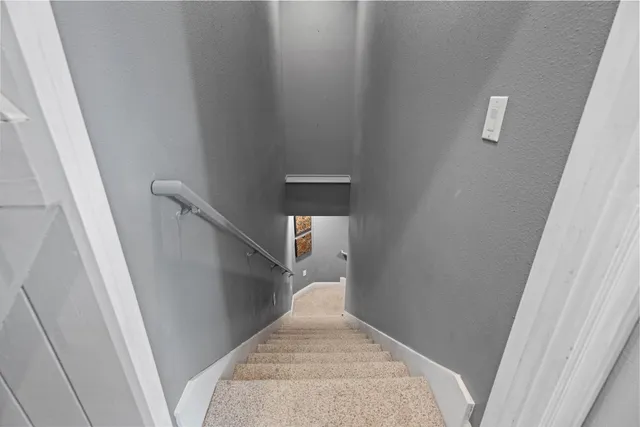 a view of a hallway view of staircase