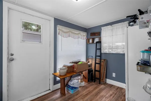 a room with furniture and a window
