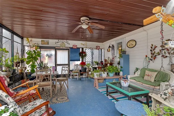 a view of a chairs and tables in patio