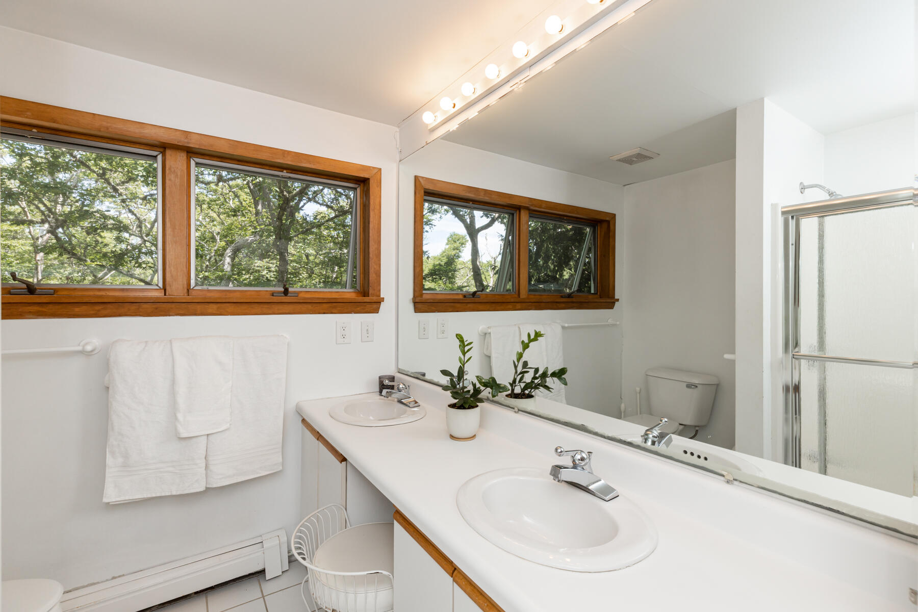 19 Proctor Road Woods Hole, MA 02543 - Photo 22 of 43 a bathroom with a sink and a mirror