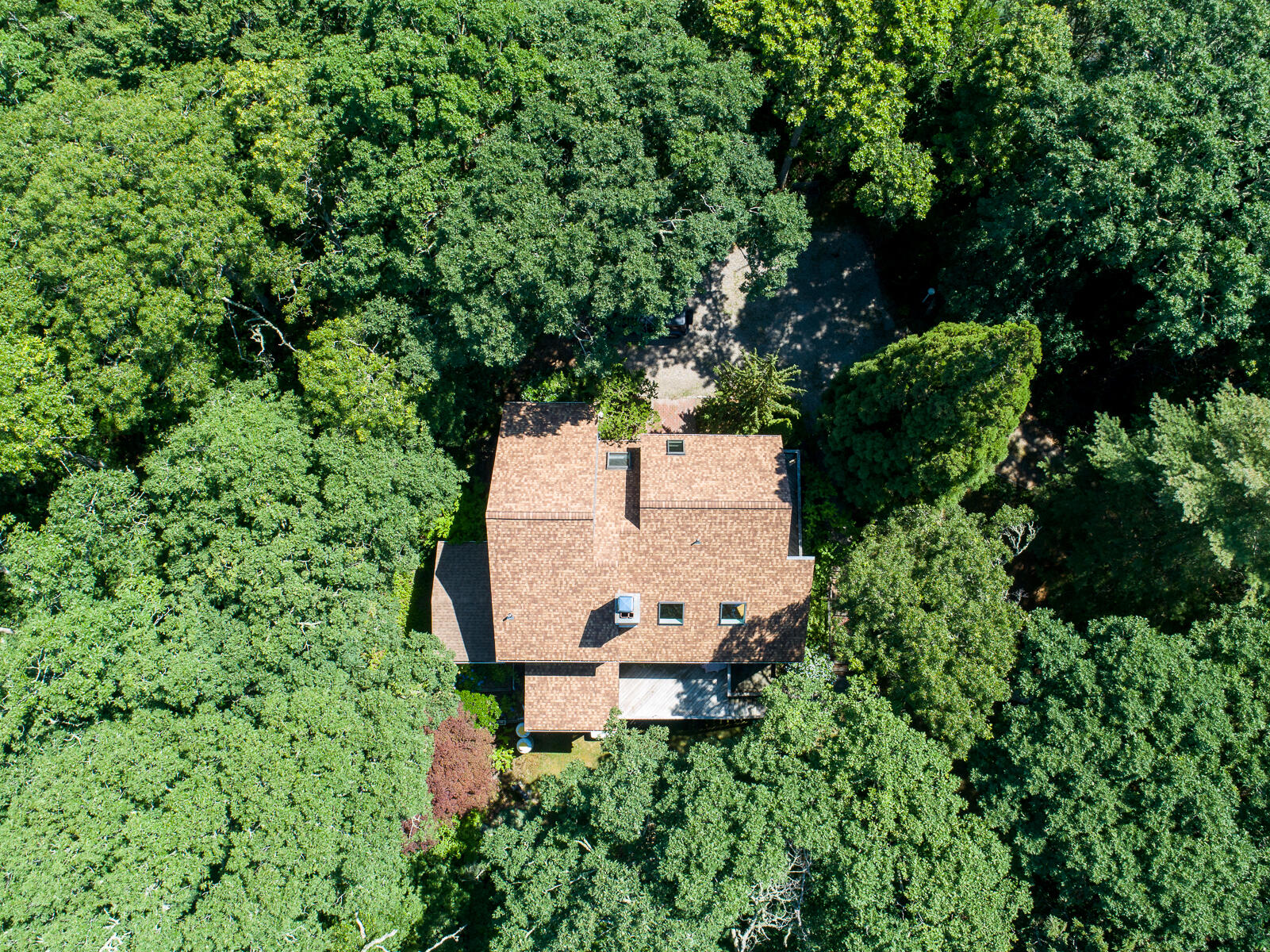 19 Proctor Road Woods Hole, MA 02543 - Photo 40 of 43 an aerial view of a house with yard and outdoor seating