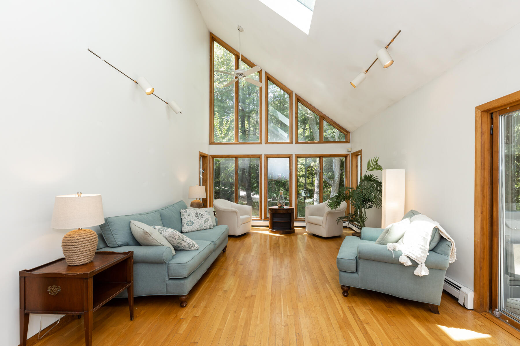 19 Proctor Road Woods Hole, MA 02543 - Photo 5 of 43 a living room with furniture and a large window
