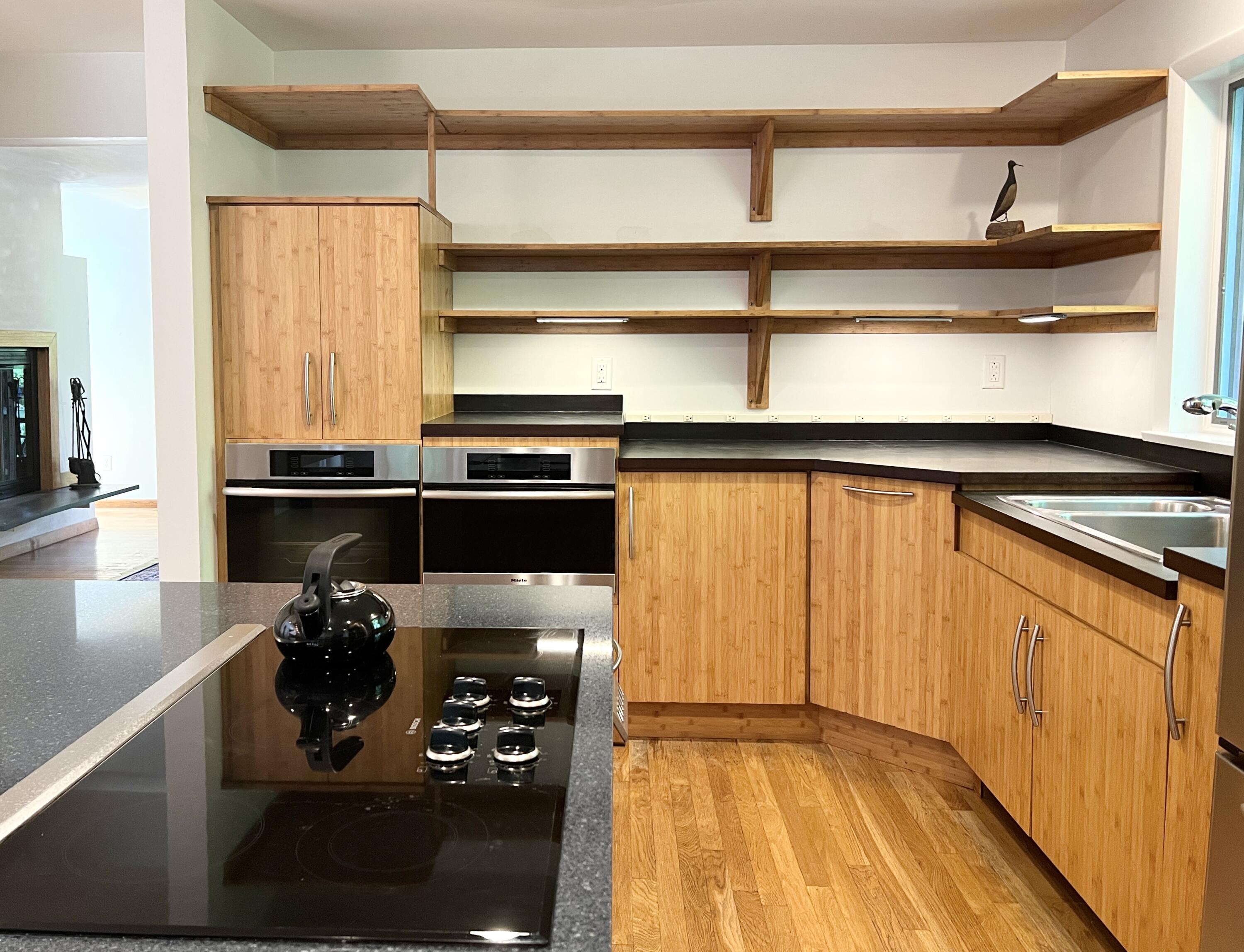 19 Proctor Road Woods Hole, MA 02543 - Photo 7 of 43 a kitchen with a sink and a refrigerator