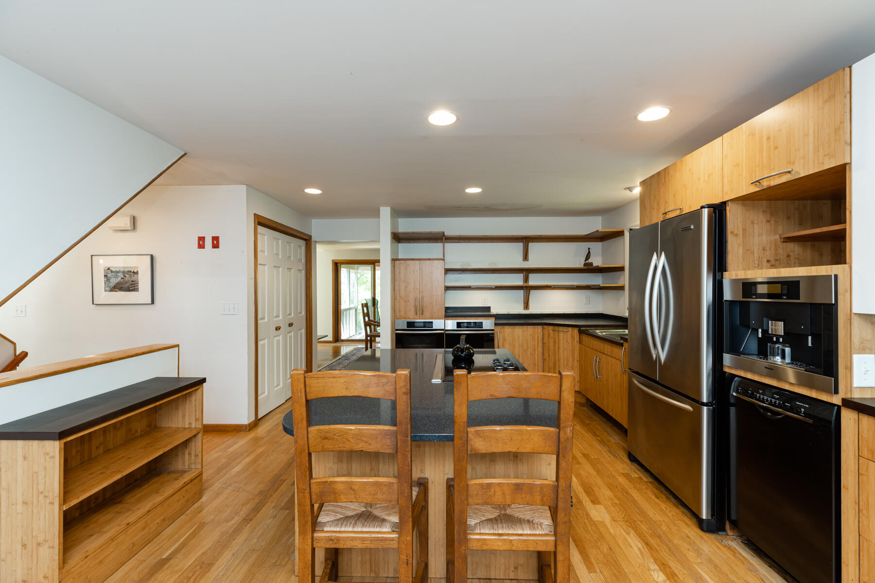 19 Proctor Road Woods Hole, MA 02543 - Photo 8 of 43 a kitchen with stainless steel appliances granite countertop a refrigerator and a stove top oven