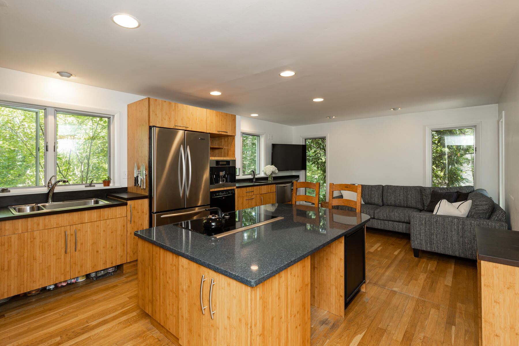 19 Proctor Road Woods Hole, MA 02543 - Photo 9 of 43 a kitchen with kitchen island granite countertop a sink stove and refrigerator