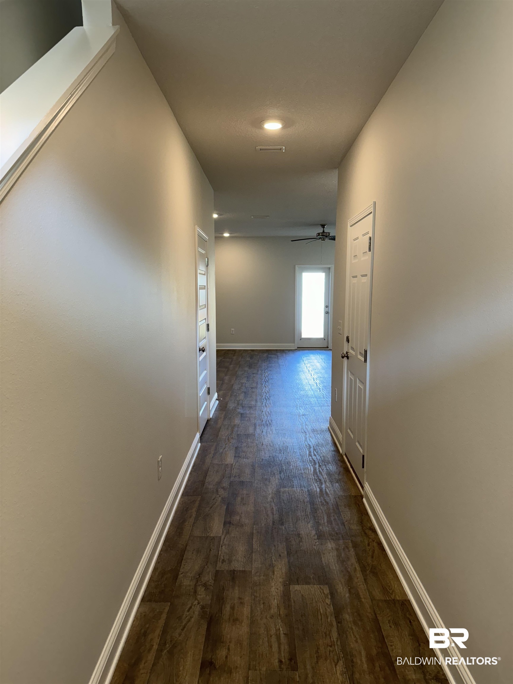 25806 Pollard Road, Unit 42 Daphne, AL 36526 - Photo 2 of 21 Corridor with dark hardwood / wood-style floors