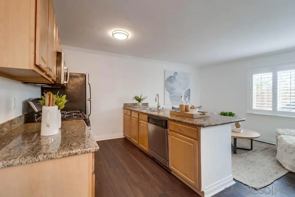 4375 Felton Street, Unit 3 San Diego, CA 92104 - Photo 13 of 27 a kitchen with a sink and stove top oven