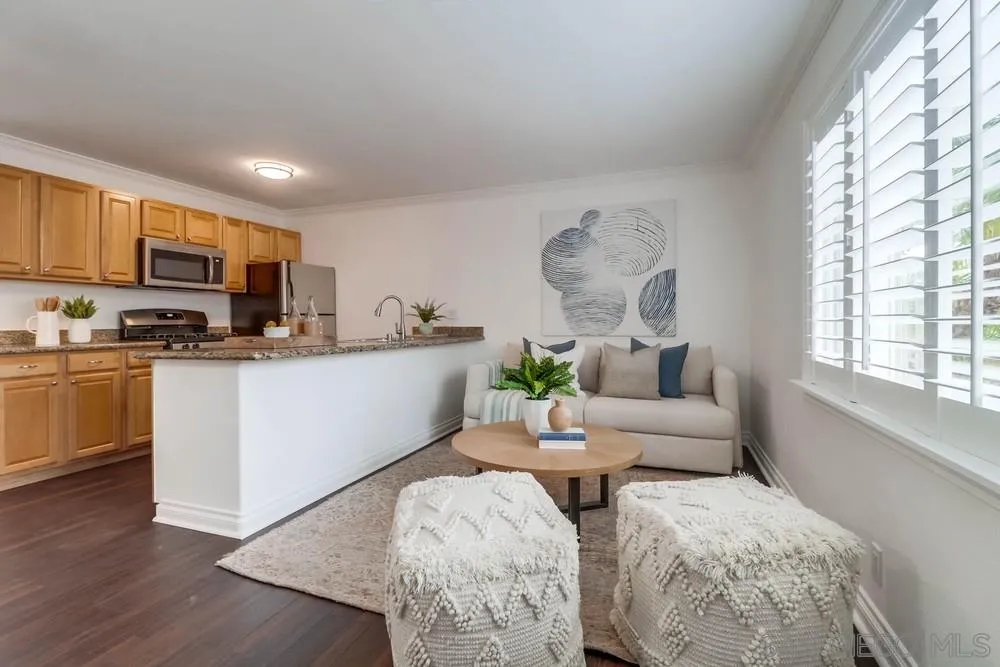 4375 Felton Street, Unit 3 San Diego, CA 92104 - Photo 2 of 27 a living room with furniture and a kitchen area