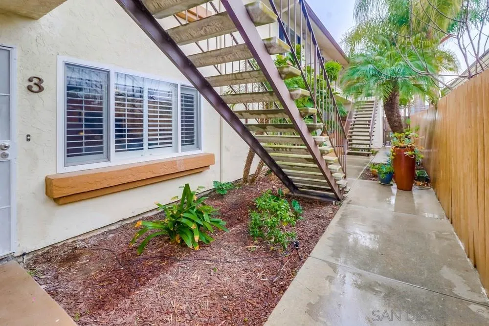 4375 Felton Street, Unit 3 San Diego, CA 92104 - Photo 25 of 27 a house with potted plants in front of it
