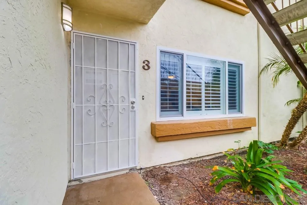 4375 Felton Street, Unit 3 San Diego, CA 92104 - Photo 26 of 27 a front view of a house with a garden