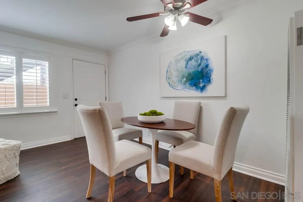 4375 Felton Street, Unit 3 San Diego, CA 92104 - Photo 9 of 27 a view of a dining room with furniture and wooden floor