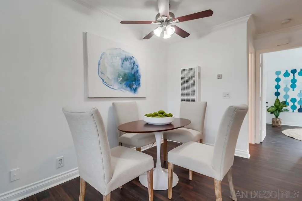 4375 Felton Street, Unit 3 San Diego, CA 92104 - Photo 10 of 27 a view of a dining room with furniture and wooden floor