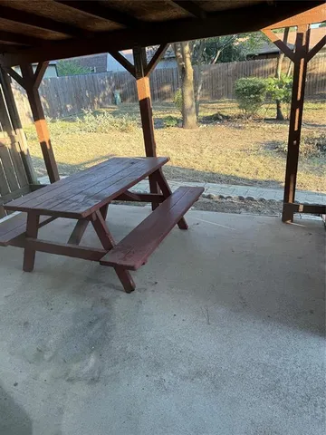 a view of swimming pool with a porch