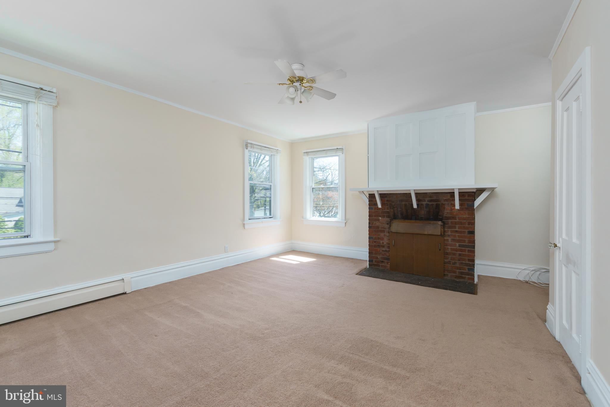 124 Washington Road, Unit 2 Princeton Junction, NJ 08540 - Photo 12 of 18 a view of an empty room with a window