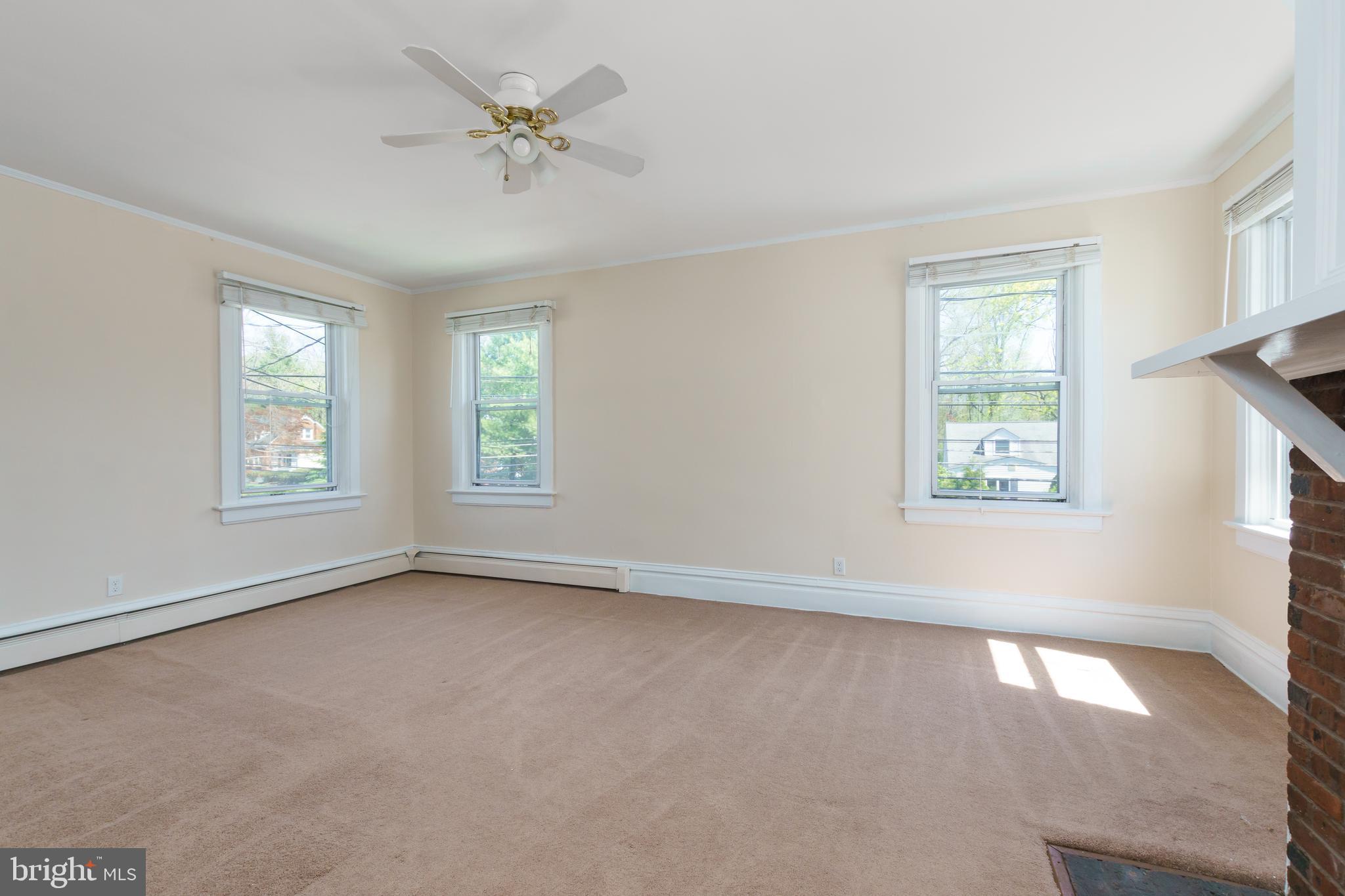 124 Washington Road, Unit 2 Princeton Junction, NJ 08540 - Photo 13 of 18 a view of an empty room with a window