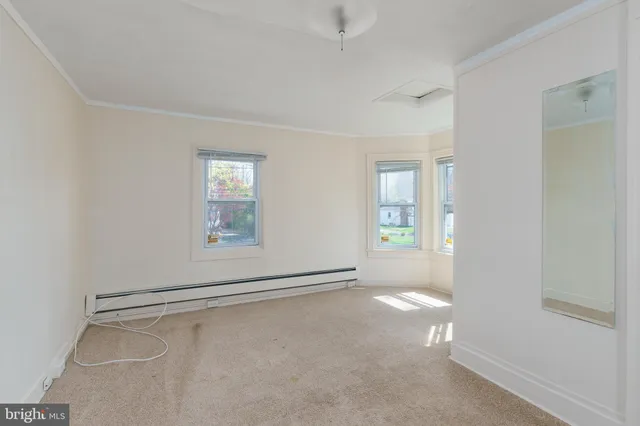 a view of an empty room with window