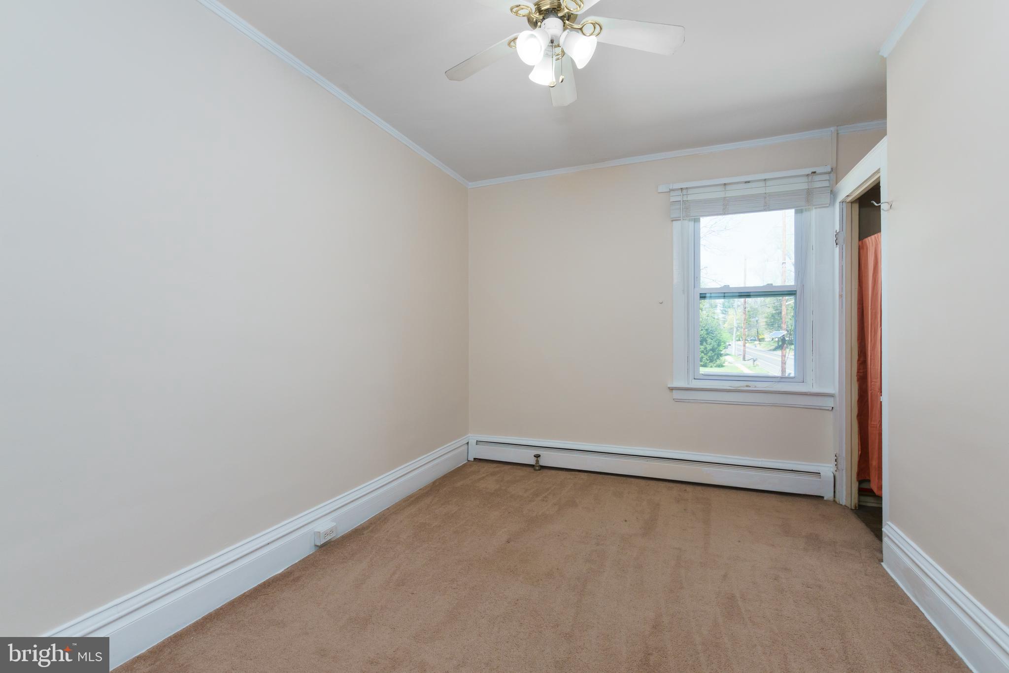 124 Washington Road, Unit 2 Princeton Junction, NJ 08540 - Photo 16 of 18 an empty room with a window