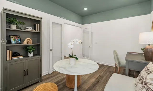 a view of a dining room with furniture