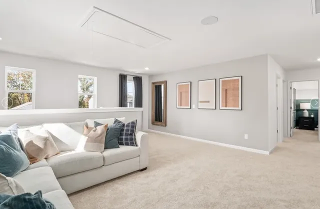 a living room with furniture and a couch