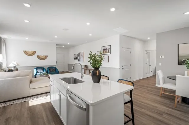 a kitchen with a table and chairs