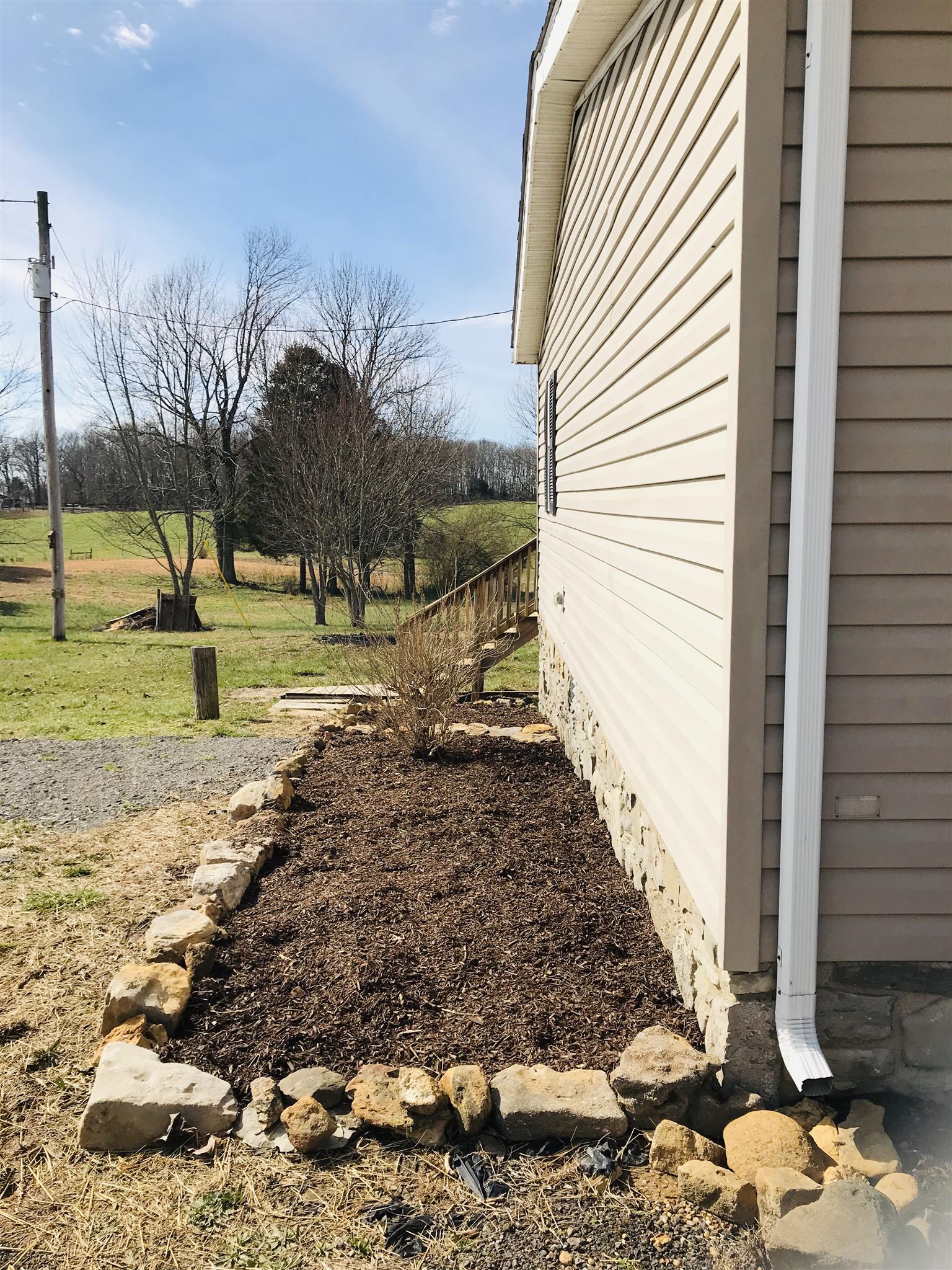 145 Absher Road Portland, TN 37148 - Photo 21 of 22 a view of a backyard of the house